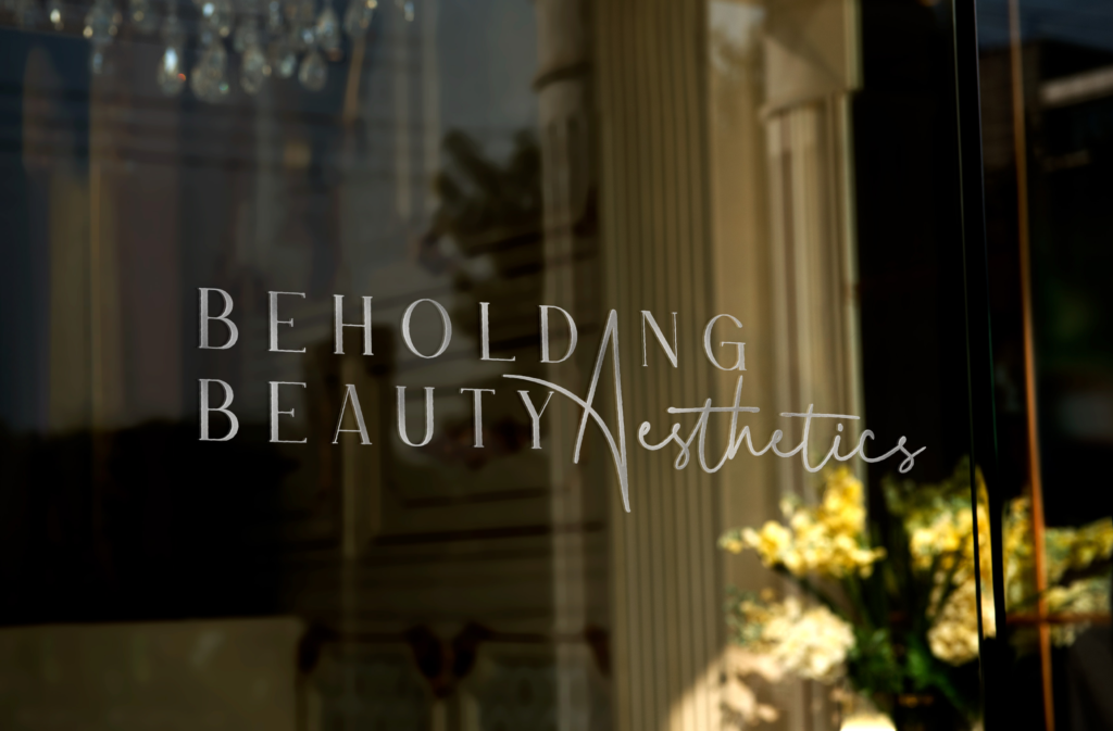 Beholding Beauty Aesthetics window logo by Jeanine Kelley Design